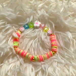 Cute watermelon color bracelet saying”slay” pretty.Durable Strachey gold beads.